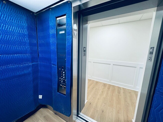 Building Photo - Brand New Luxury Condo - Top Floor