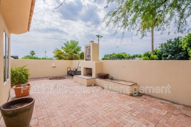 Building Photo - 7024 E Orange Blossom Ln