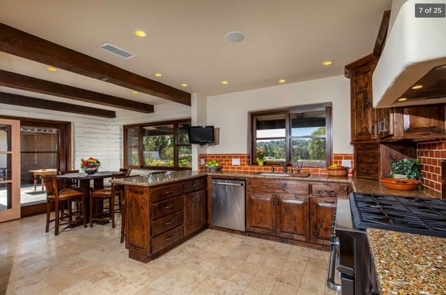 Building Photo - This Beautiful Hacienda Style Home combine...