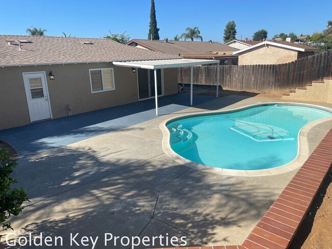 Building Photo - Nicely renovated corner property with a pool!