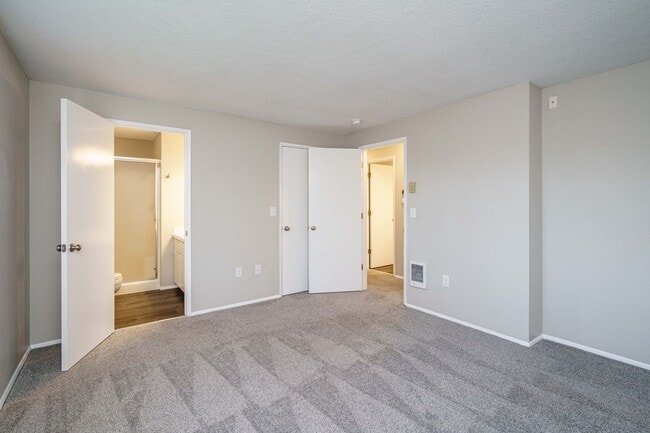 Building Photo - Recently Updated with Wood Laminate Flooring and Fresh Paint