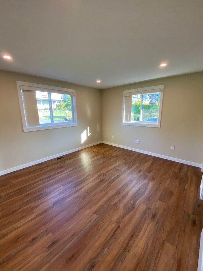 Building Photo - Modern 4-Bedroom Home with Panoramic Water & Mountain Views