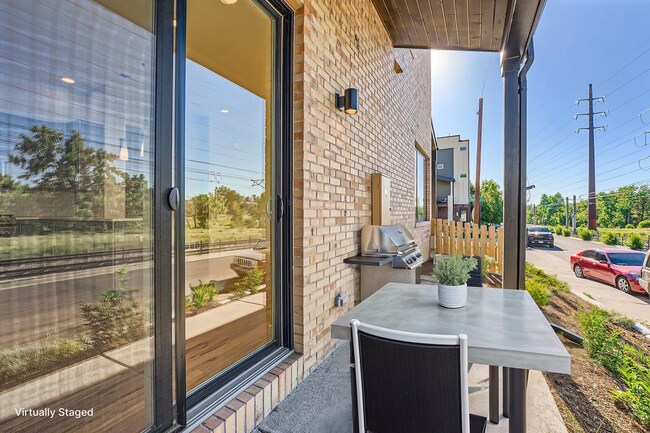 Building Photo - Modern 4BR Townhome Near Sloan’s Lake | Rooftop Deck, Finished Basement & Garage