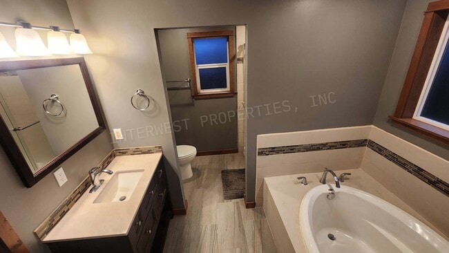 Building Photo - 3 bd 2.5ba Ranch Style Home with Fenced Yard, W/D in Unit, Fireplaces & 2 Car Garage!