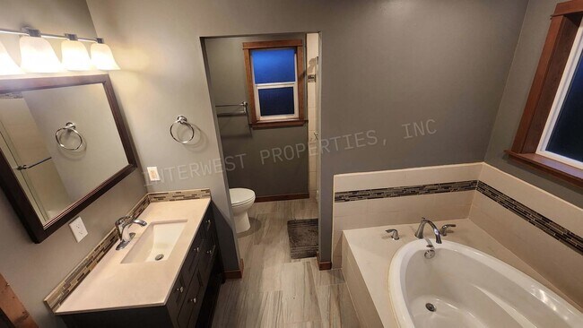 Building Photo - 3 bd 2ba Ranch Style Home with Fenced Yard, W/D in Unit, Fireplaces & 2 Car Garage!