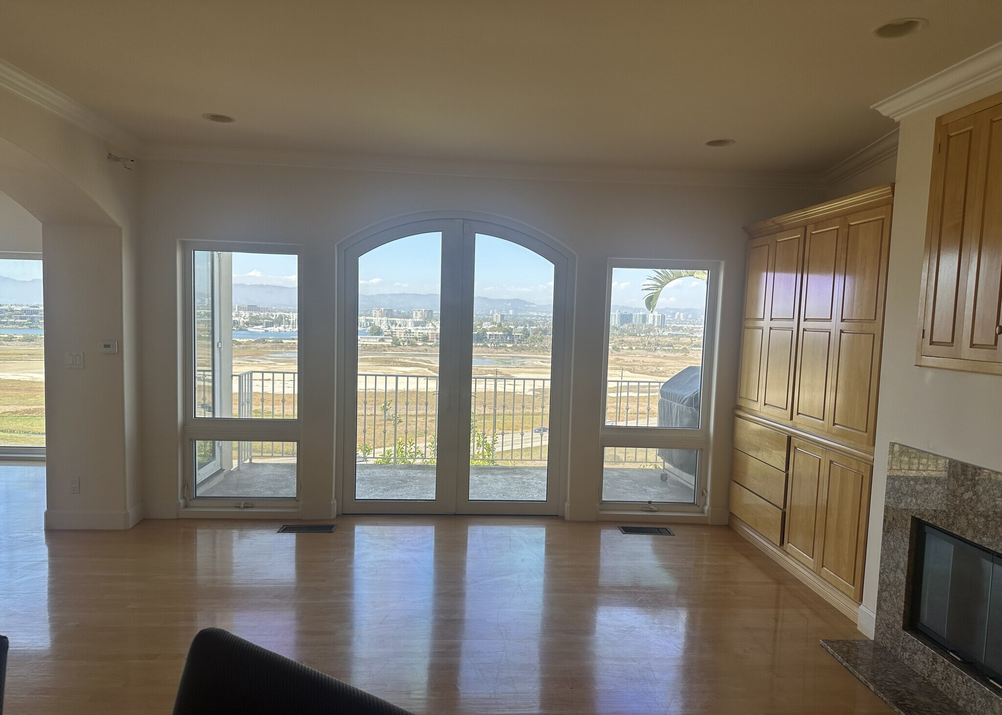 Spacious family room seamlessly connects to the kitchen, dining area, and cozy fireplace - 8120 Billowvista Dr