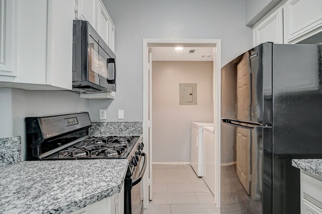 Building Photo - Check out this 2 bedroom upgraded condo!