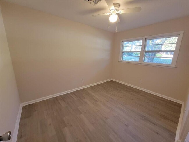 Building Photo - NEW Floors, Roof, Lights, Appliances, ect....