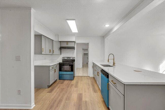 Building Photo - 4BR/3BA Updated Home – Quiet Cove + Fenced Yard!