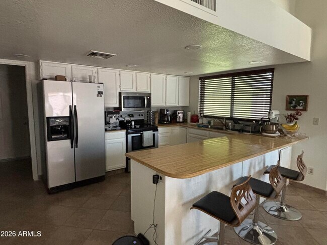 Building Photo - 11322 N 69th Dr