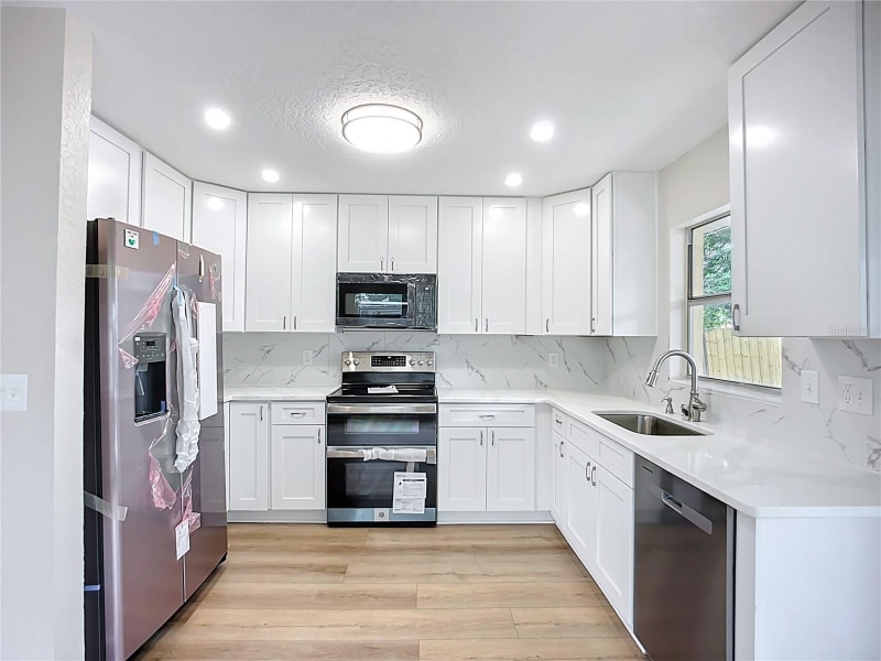 Building Photo - 6511 3rd Ave NE