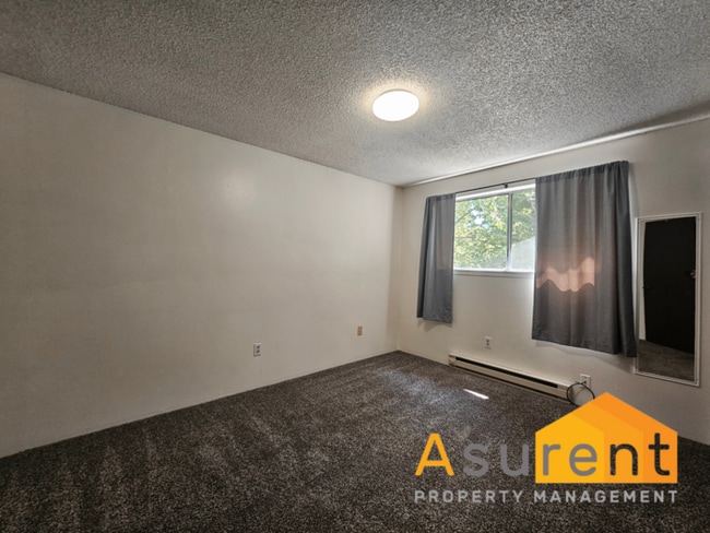 Building Photo - Bright & Spacious 2-Bedroom Apartment in A...