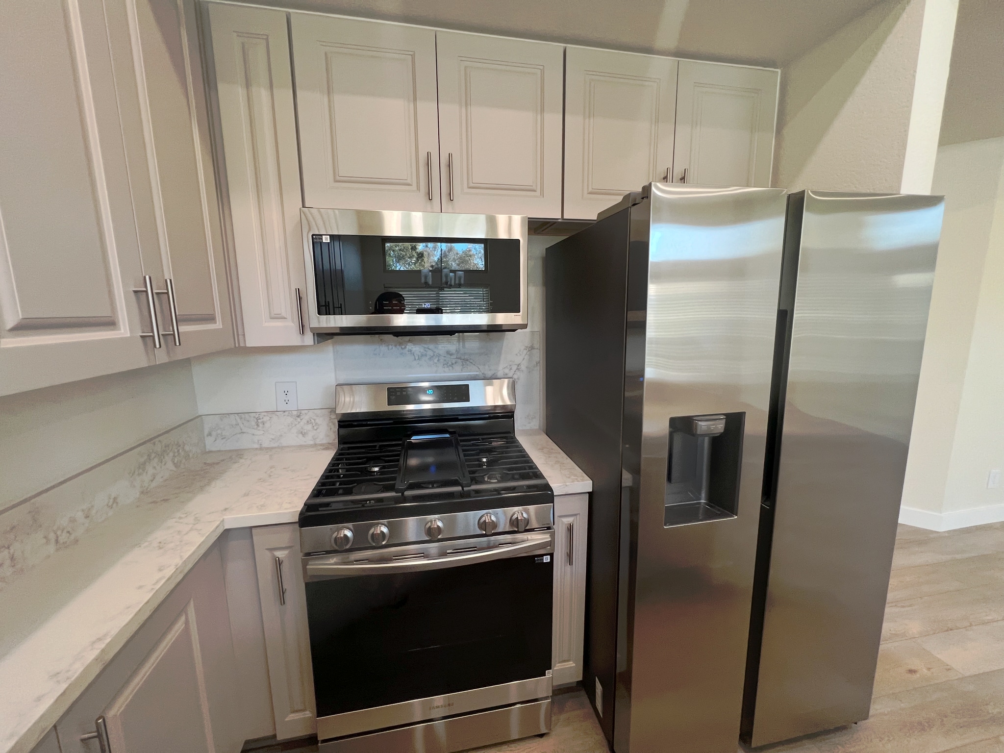 New Samsung range, over, microwave, and refrigerator - 8 Town and Country Rd