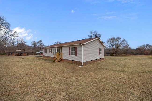 Building Photo - Charming 4-Bedroom Home on Spacious 2.64-Acre Lot in Graham, NC