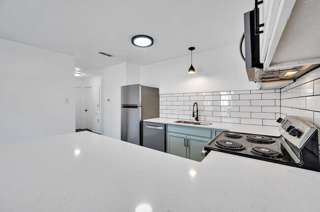 Building Photo - 5311 Tennyson Dr