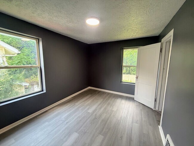 Building Photo - Three bedroom one bathroom single-family home for rent