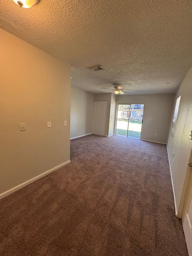 Building Photo - Spacious Poinciana Townhome