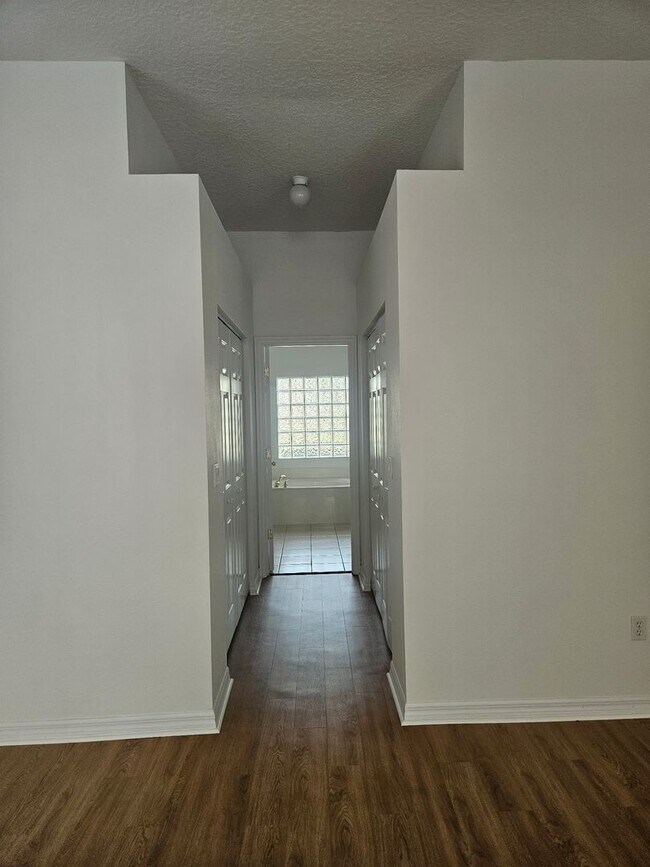Building Photo - 4 BEDROOM 3 FULL BATH HOME WITH A SCREENED IN POOL IN THE BEAUTIFUL PALM COAST