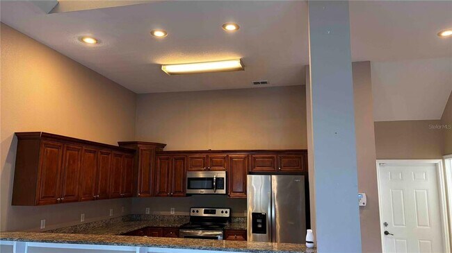 Building Photo - 9410 Citrus Glen Pl