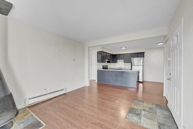 Building Photo - $940.95 with Half Off the first month's rent, 1 Bed, 1 Bath, Condo in Denver with Cozy Fireplace!