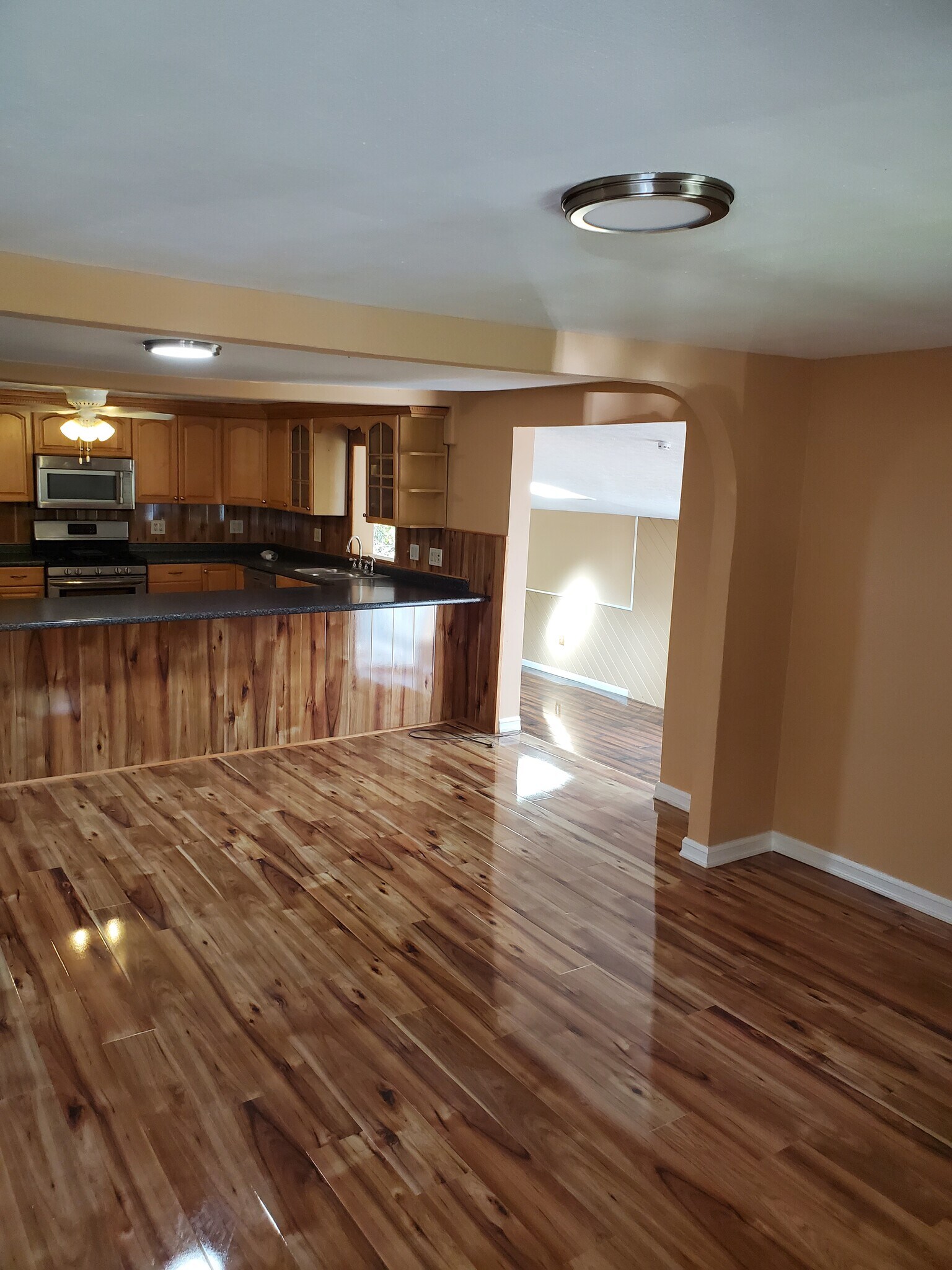 Kitchen looking into Living room - 62 Glen Ave