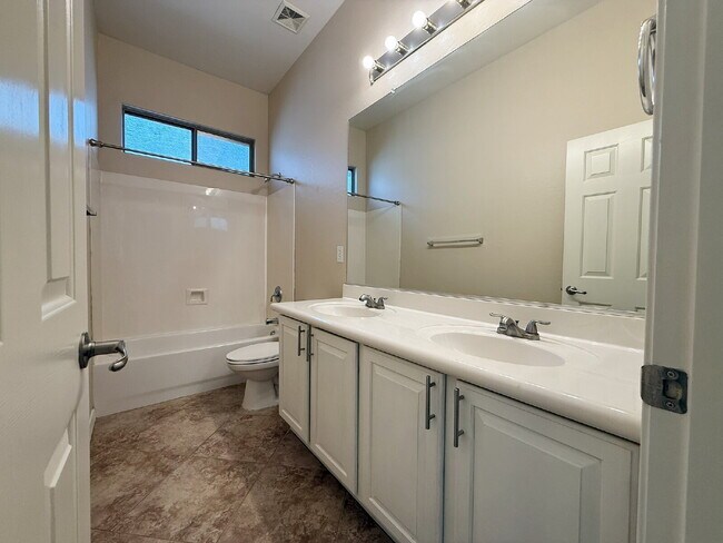 Building Photo - "Spacious 3-Bedroom/2 Full Bath Home with ...