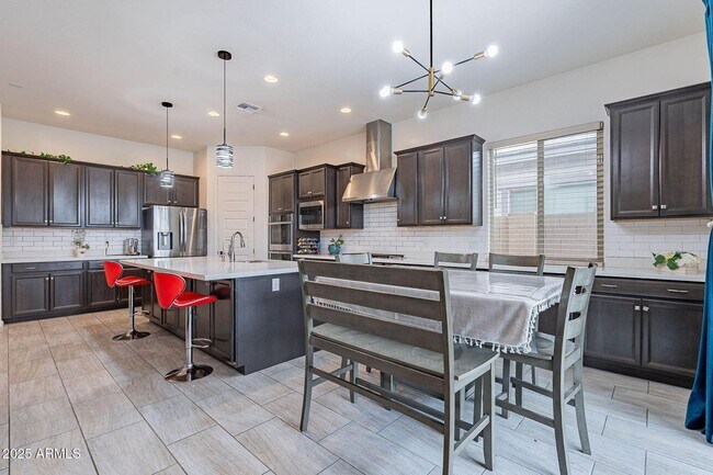 Building Photo - Charming 5-bed, 4.5-bath, 3 Car home with ...