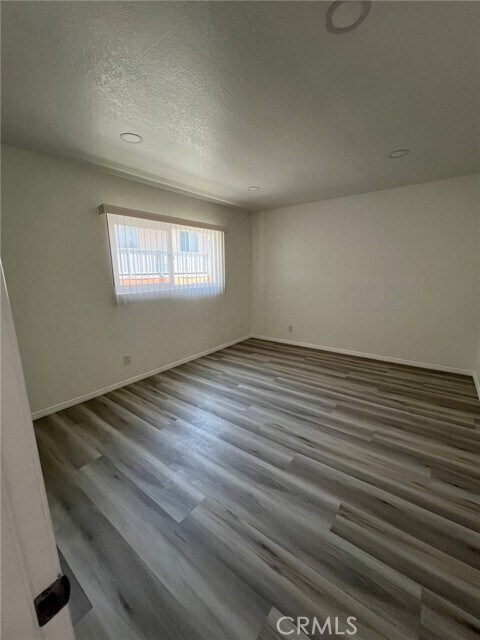 Building Photo - 7039 Remmet Ave