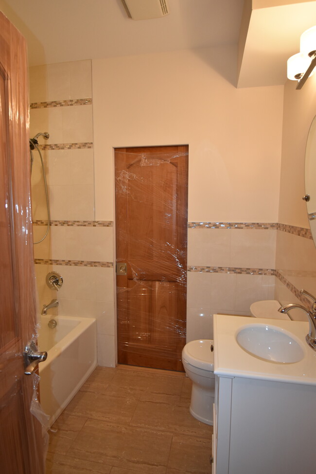 Bathroom access from bedroom and kitchen - 95 Sherman Ave