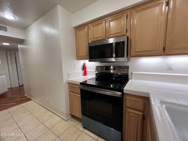 Building Photo - Welcome to this beautifully situated first-floor end unit