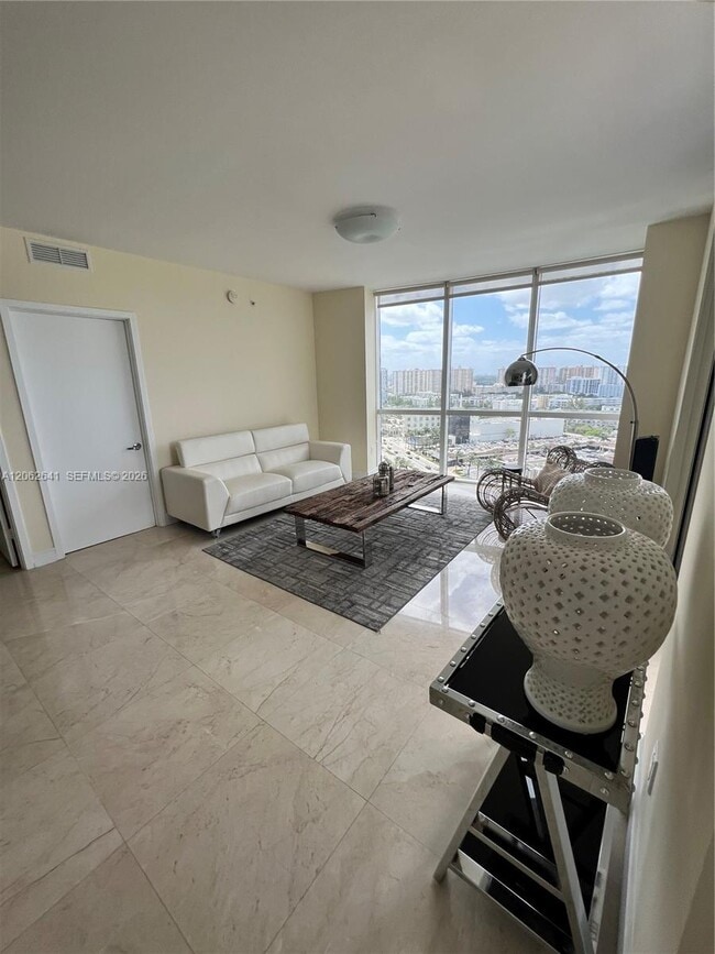 Building Photo - 18201 Collins Ave