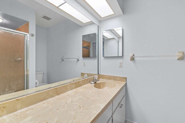 Building Photo - Freshly Updated 2BR Condo with Private Balcony, Community Pool, & In-Unit Laundry