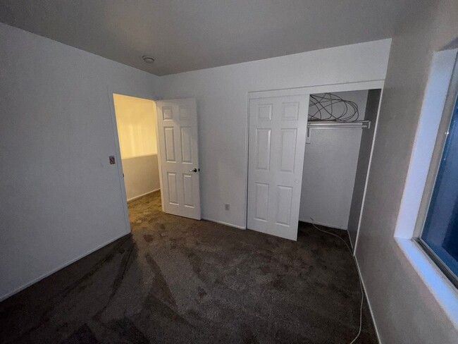 Building Photo - Fresh Paint/New Flooring all inside! Four ...
