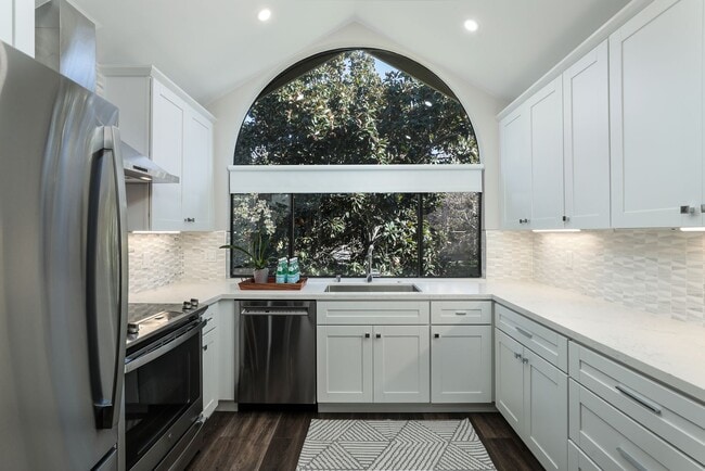 Primary Photo - Impeccably remodeled unit-don't miss this ...