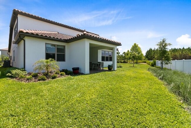 Building Photo - 4 Bedroom/3.5 Bathroom Gated Community at Ruby Lake!!!!