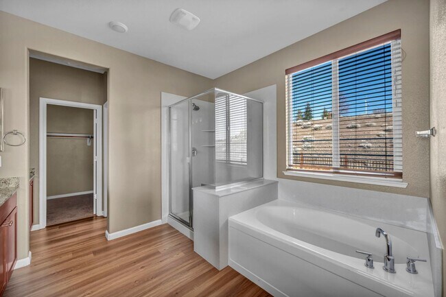 Building Photo - Sun-Filled, Spacious Living with a Three-Car Garage