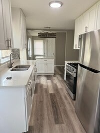 Building Photo - To apply please visit our website www.dadpropertiesnwi.com
