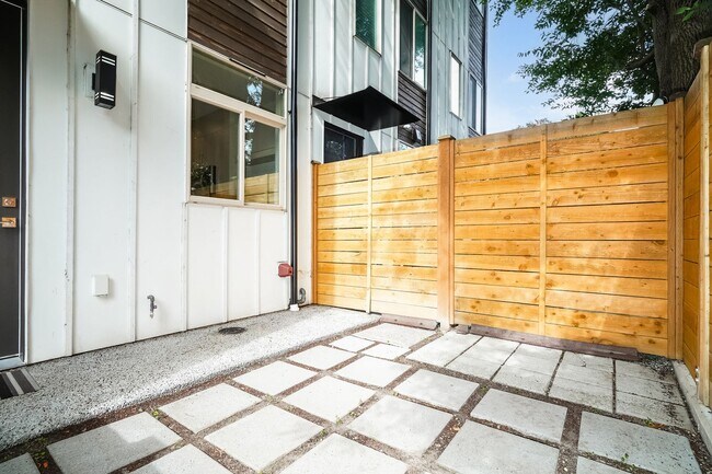 Building Photo - Stylish 3 Bedroom with Rooftop Decks and Dedicated Parking