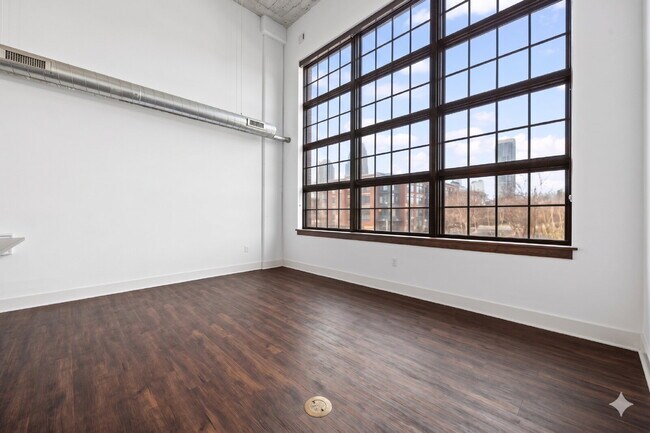 Building Photo - Urban Loft Condo Featuring Stunning Views & Rooftop Entertaining