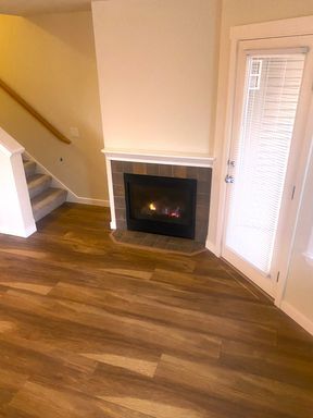 Building Photo - LIKE NEW three bedroom with fantastic updates, one car garage and private newly fenced front patio!