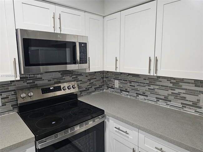 Building Photo - 1680 NW 128th St