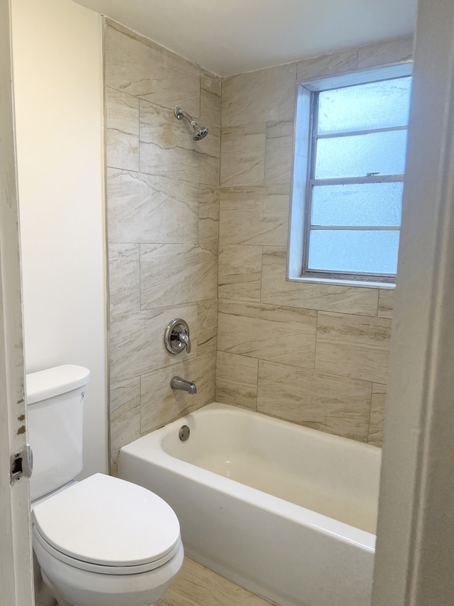 Building Photo - LARGE NEWLY RENOVATED 2 BEDROOM APARTMENTS + OFFICE Application fee is waived during move in