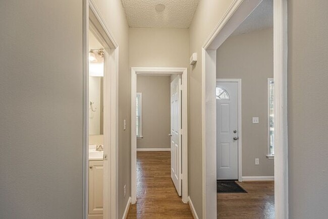 Building Photo - Like New Home off Freeman Mill. Just Painted, New Wood/Vinyl Flooring, Vaulted Ceilings, Front Po...