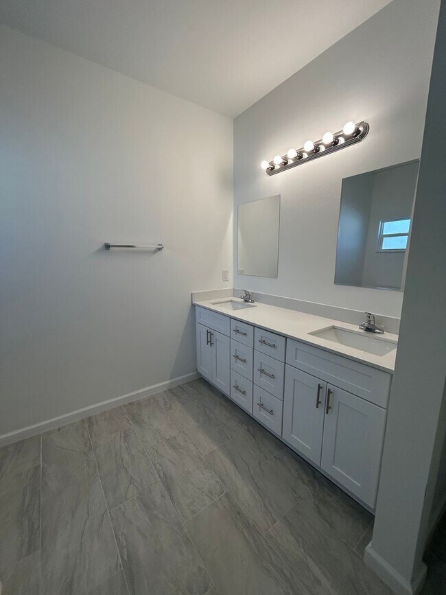 Building Photo - Brand-New & Modern! 4/2/2 Home in Desirable SW Lehigh Acres