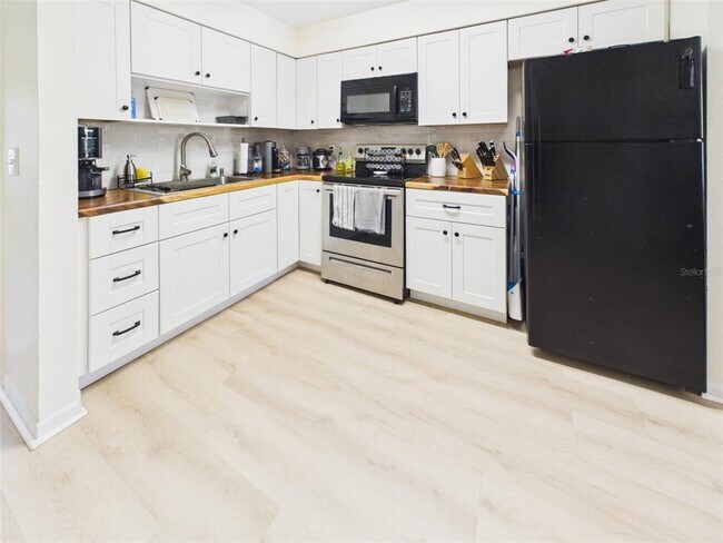 Building Photo - 1411 E 109th Ave