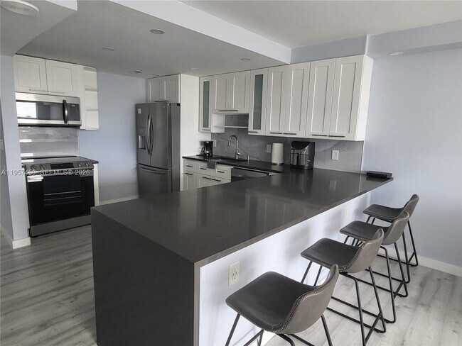 Building Photo - 3180 S Ocean Dr