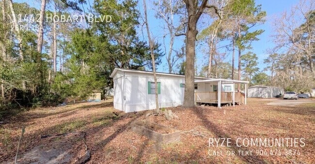 Building Photo - 11442 Hobart Blvd