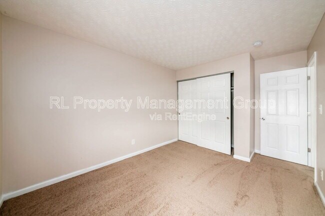 Building Photo - 7179 Feather Ct