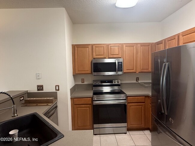 Building Photo - 9783 Summer Grove Way W