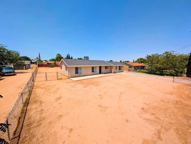 Primary Photo - 4 bed with Dual master bedrooms and Solar ...